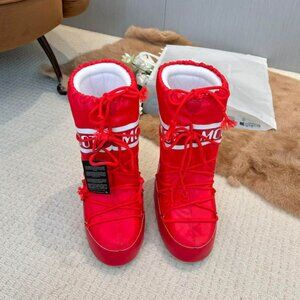 Moon Boot, the favorite of ski season, red snow boots for women